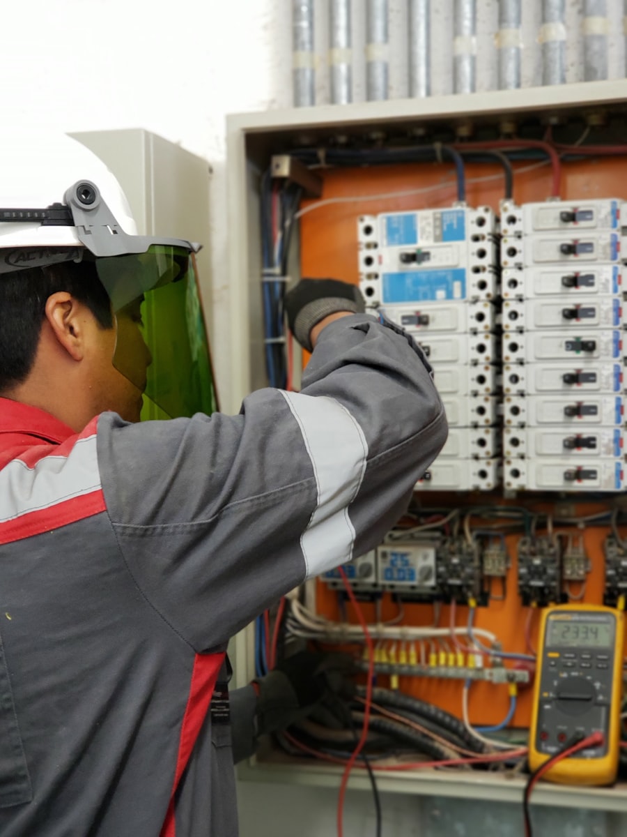 Service technician diagnosing equipment on a job