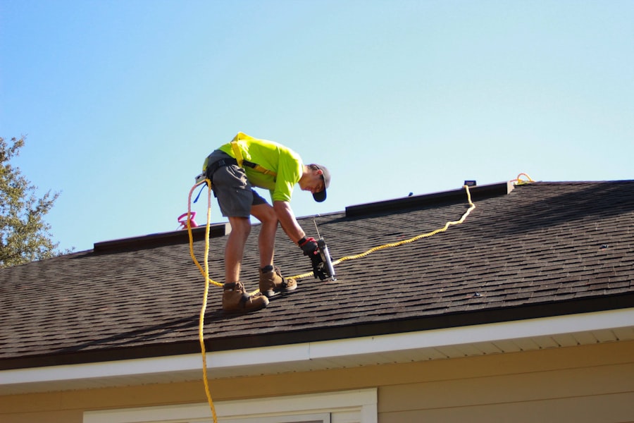 Roofing technician at work on a home